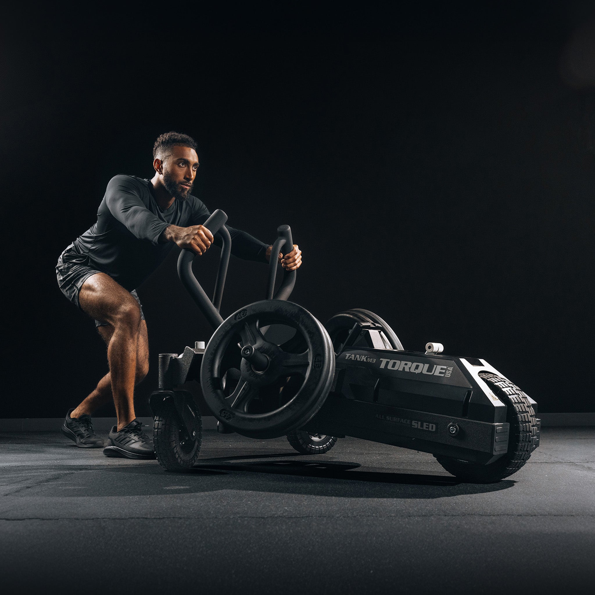 Torque TANK M3 push sled in use during commercial conditioning and performance training