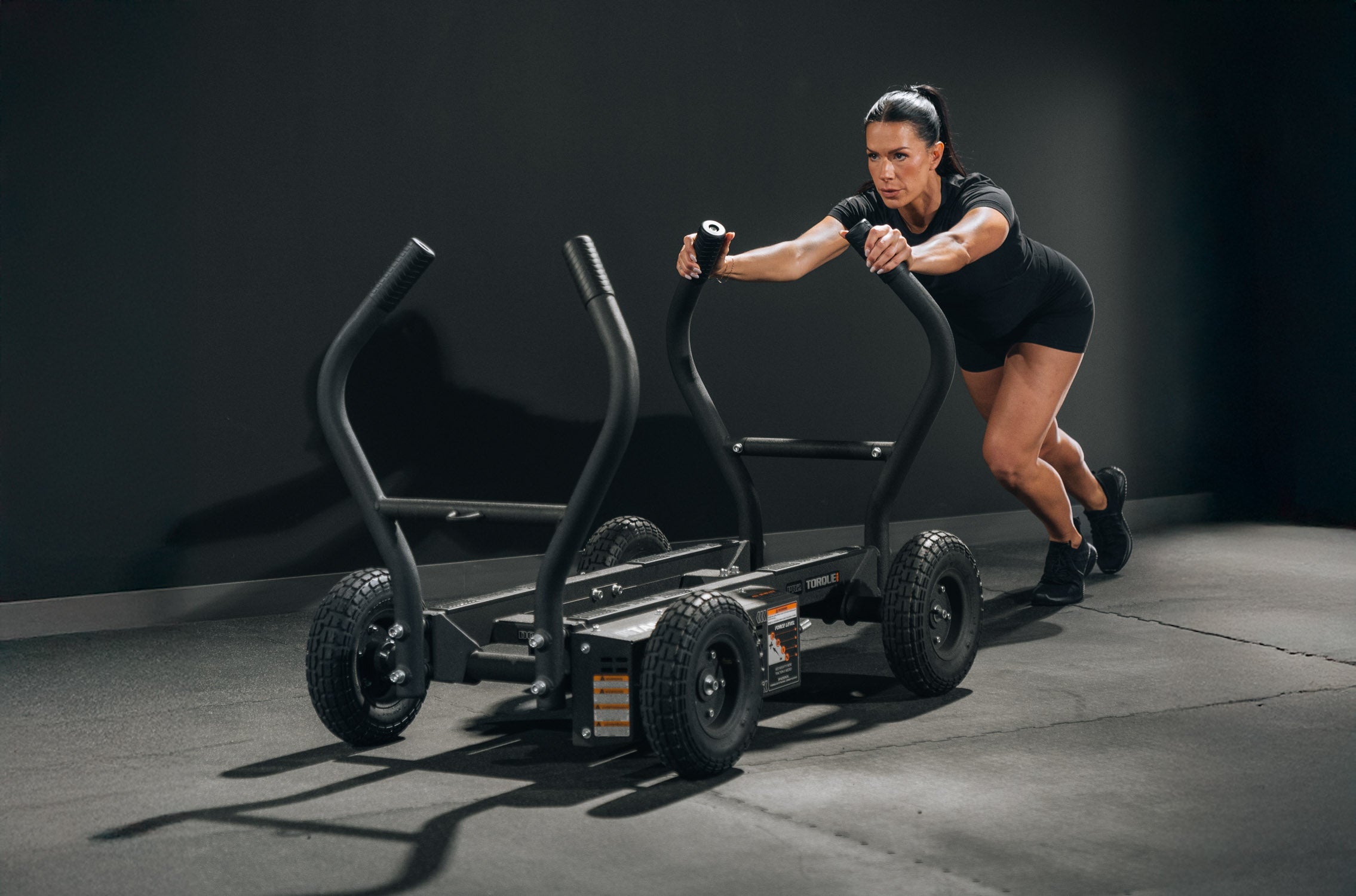 Torque TANK M4 push sled in use during commercial conditioning and performance training