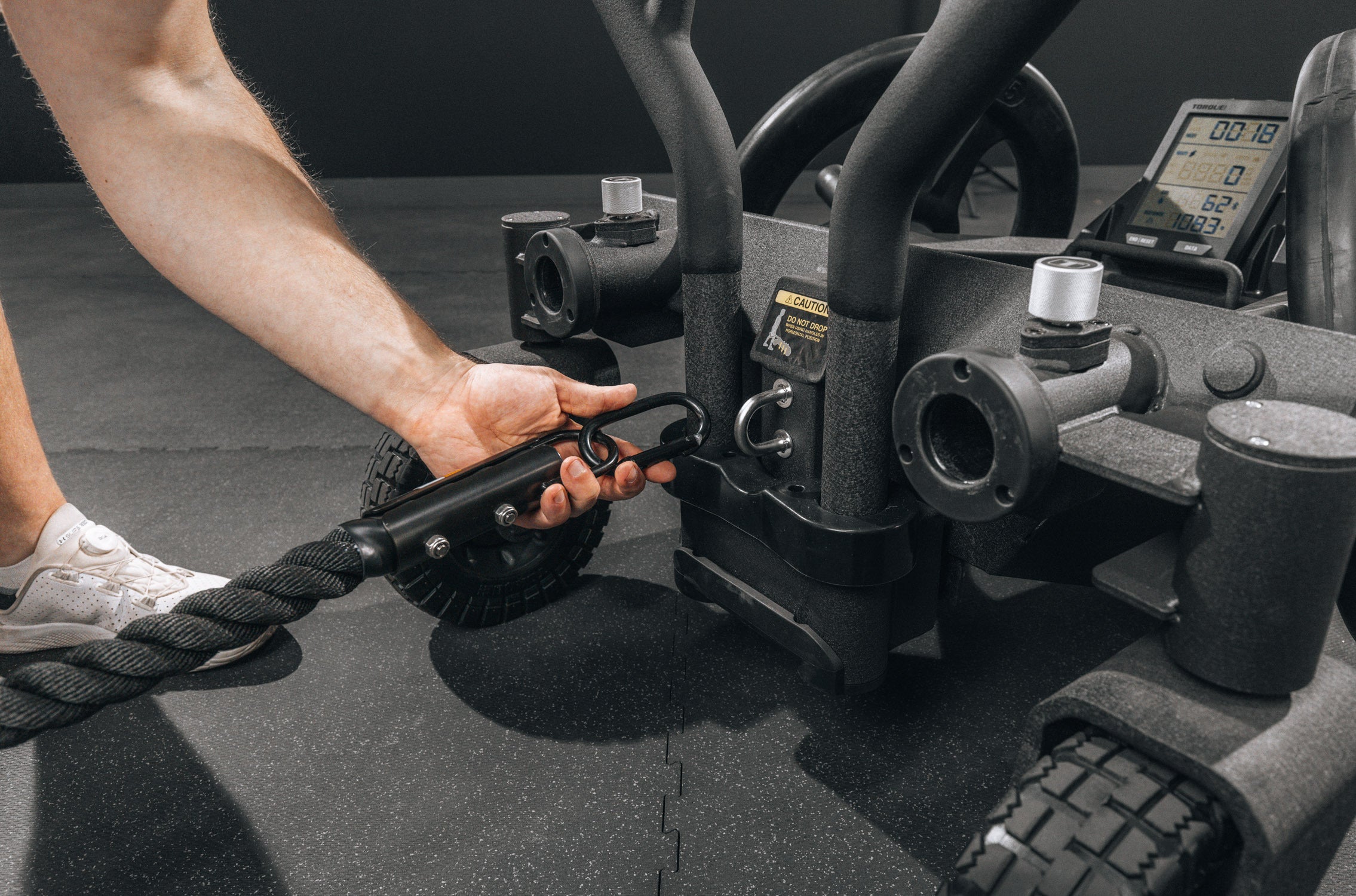 Torque TANK M3 tow hook accessory shown with the commercial push sled system for commercial gym training environments
