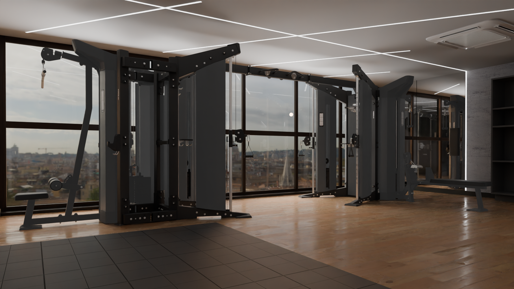 A modern gym interior with multiple dark gray cable and functional training machines, large floor-to-ceiling windows with a city view, wood flooring, black mats, and shelving.